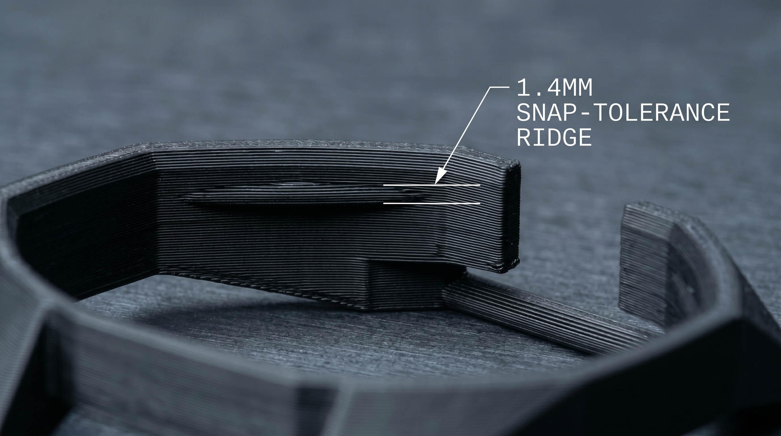 strapsnap-precision-0-25mm-snap-fit-ridge-tolerance Macro photograph of the laboratory-calibrated 0.25mm snap-fit locking ridge on a custom Swatch Royal Pop watch adapter.